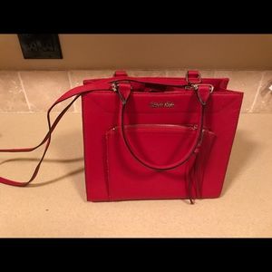 Red Calvin Klein purse.